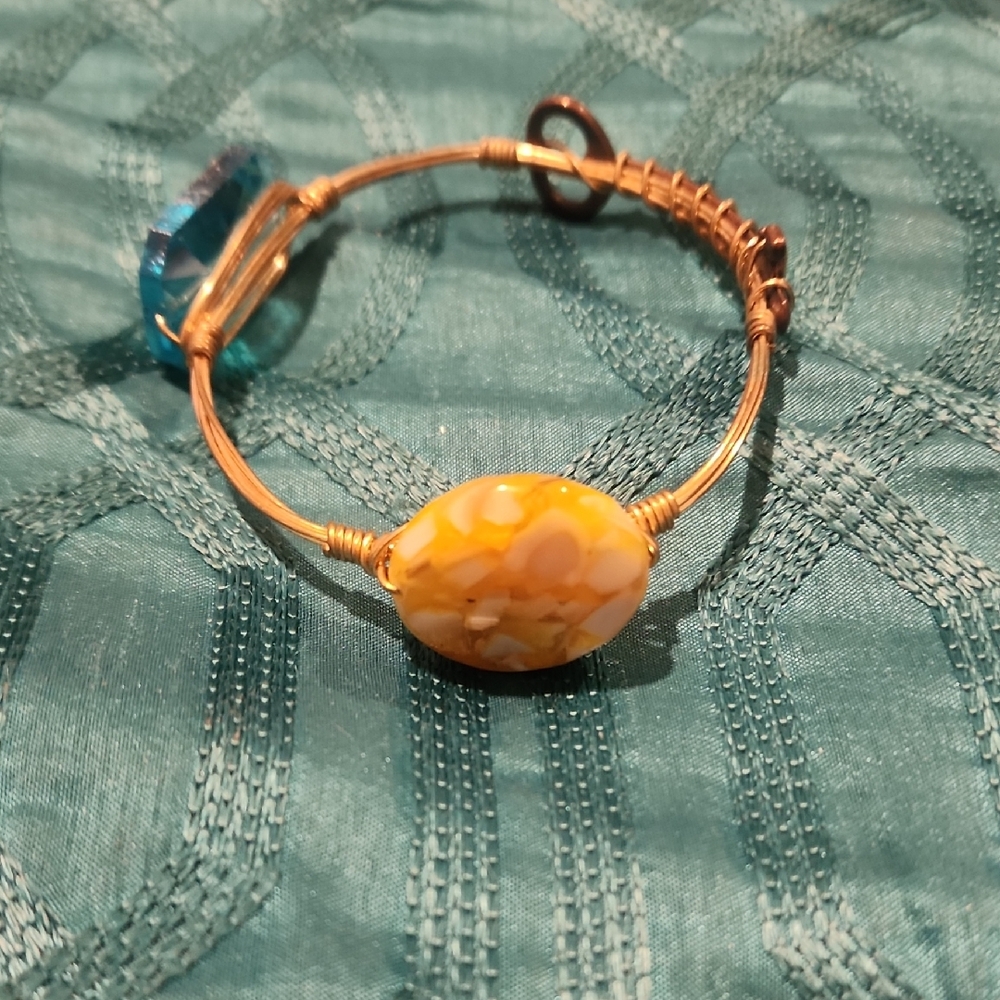 Elegant Gold and Yellow Bracelet
